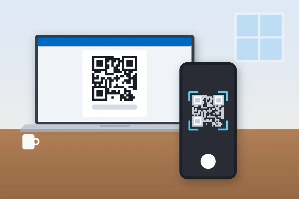 Phone scanning a laptop QR code to add an account to Microsoft Authenticator